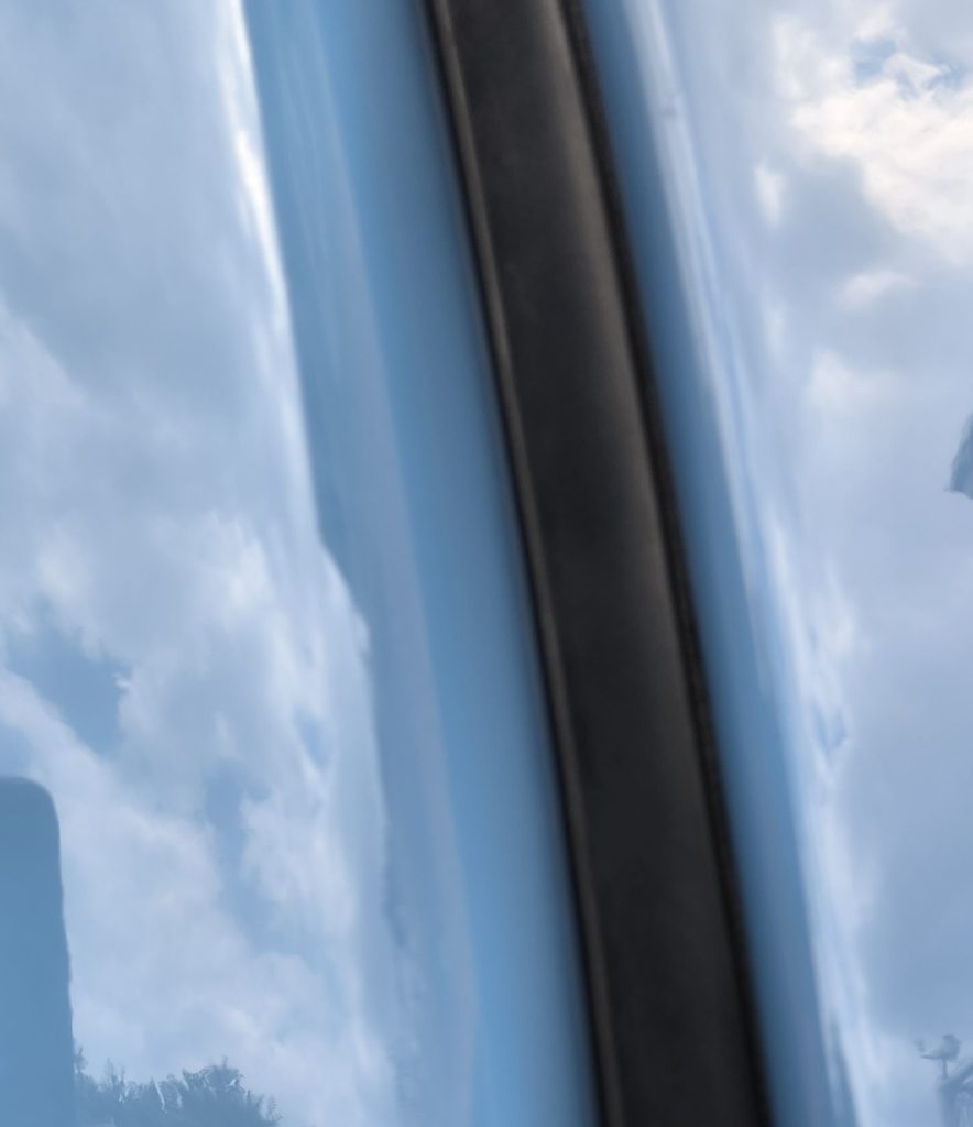 D-shaped extruded rubber seal just inside the two surfaces